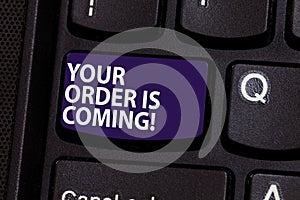 Word writing text Your Order Is Coming. Business concept for Product on the way shipping of purchase products Keyboard