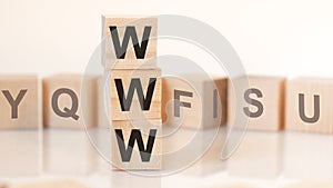 Word www from wooden blocks with letters, concept