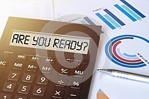 Word ARE YOU READY on calculator. Business and finance concept