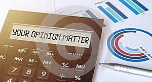 Word YOUR OPINION MATTER on calculator. Business and finance concept