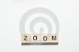 Word zoom made of wooden blocks isolated on white background