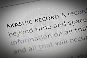The words Akashic Record close up on paper