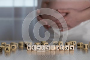 Words BIRTH PLAN composed of wooden letters