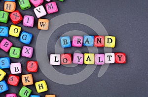 The words Brand Loyalty on black background