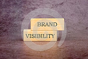 Words Brand visibility on wooden blocks. The concept of a business idea