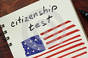 Words citizenship test and American flag.