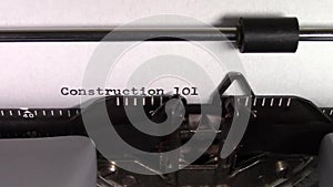 The words `Construction 101 ` being typed on a typewriter