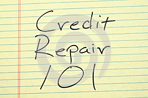 Credit Repair 101 On A Yellow Legal Pad photo