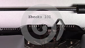 The words `Ebooks 101 ` being typed on a typewriter