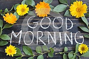 Words Good Morning with Leaves and Marigold Flowers