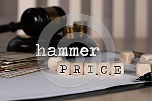 Words HAMMER PRICE composed of wooden dices