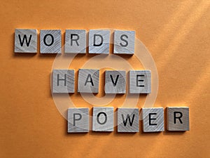 Words Have Power, isolated on orange background