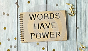 Words have power sign - white chalk text