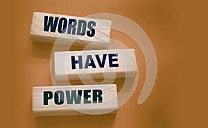 Words Have Power - text on wooden blocks on dark grey background. Powerfull force of communication, storytelling