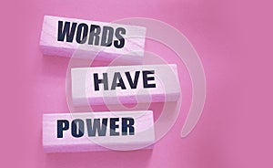 Words Have Power - text on wooden blocks on dark grey background. Powerfull force of communication, storytelling