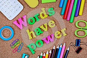 Words have power written on cork background