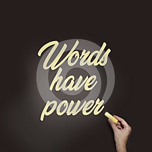 words have power written with woman`s hand on blackboard. Copyrighting PR, mass media or communication concept