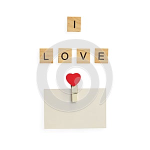 The words I LOVE YOU made with wooden letters, love and Valentines day, heart symbol. solated on white background with clipping