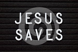 Jesus Saves Reminder on a Notice Board photo