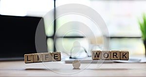 Words Life and work on scales in office