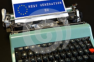 words \'Next Generation EU\' typed on a vintage typewriter.