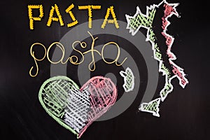 Words pasta made of cooked spaghetti and dry pasta on the black background