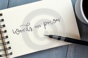 WORDS ARE POWER hand-lettered in notepad photo