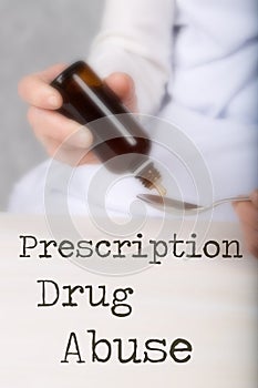 Words PRESCRIPTION DRUG ABUSE. Old woman and glass bottle of tincture