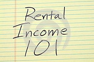 Rental Income 101 On A Yellow Legal Pad photo
