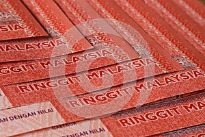 Words RINGGIT MALAYSIA On A Stack Of RM10 Notes