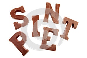 The words SINT and PIET in chocolate letters isolated on white