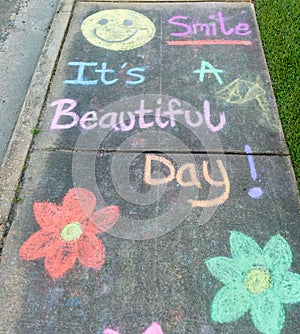 The words "smile, it's a beautiful day" photo
