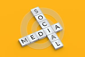 Words social media in crossword made of metallic buttons