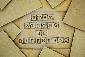 Words Stay Strong Be Different make by black alphabet stamps on