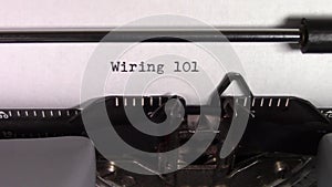 The words `Wiring 101 ` being typed on a typewriter