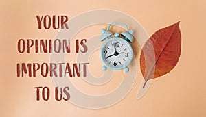 The words Your opinion is important to us are written below the clock