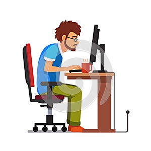 Work addict geek sitting at the computer desk