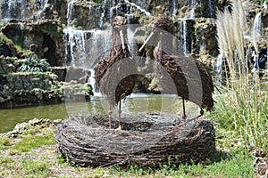 Work of art, two storks made of branches