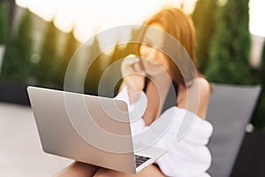 Work At Beach. Successful Business Woman Working Online In Internet Using Laptop Computer Outdoors. Girl Typing On Keyboard While