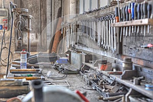 Work bench in an old dirty workshop.