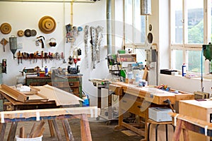 Work bench with tools in the carpenter's workshop