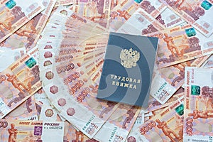 The work book is on the five thousandth Russian rubles