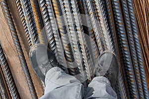 Work boots on a construction background. Protective workwear at a construction site