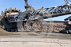 work of a bucket wheel excavator in a quarry.