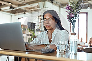 Work. Business Woman In Cafe Portrait. Smiling Freelancer Looking At Screen And Typing. Fashion Girl In Glasses Working On Laptop