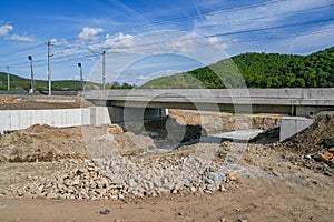 Work on the development of a stream bed against erosion and flooding.