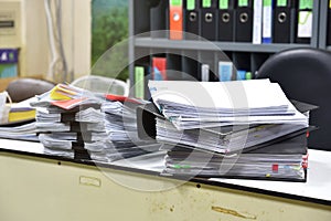 Work hard, Lot of work, Stacks of document paper and files folder.