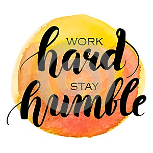 Work hard stay humble hand lettering. Watercolor background
