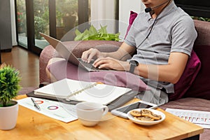 Work from home,Businessman working remotely from home. Using computer. Distance learning online education and work