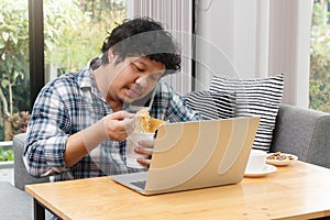 Work from home,Businessman working remotely from home. Using computer. Distance learning online education and work